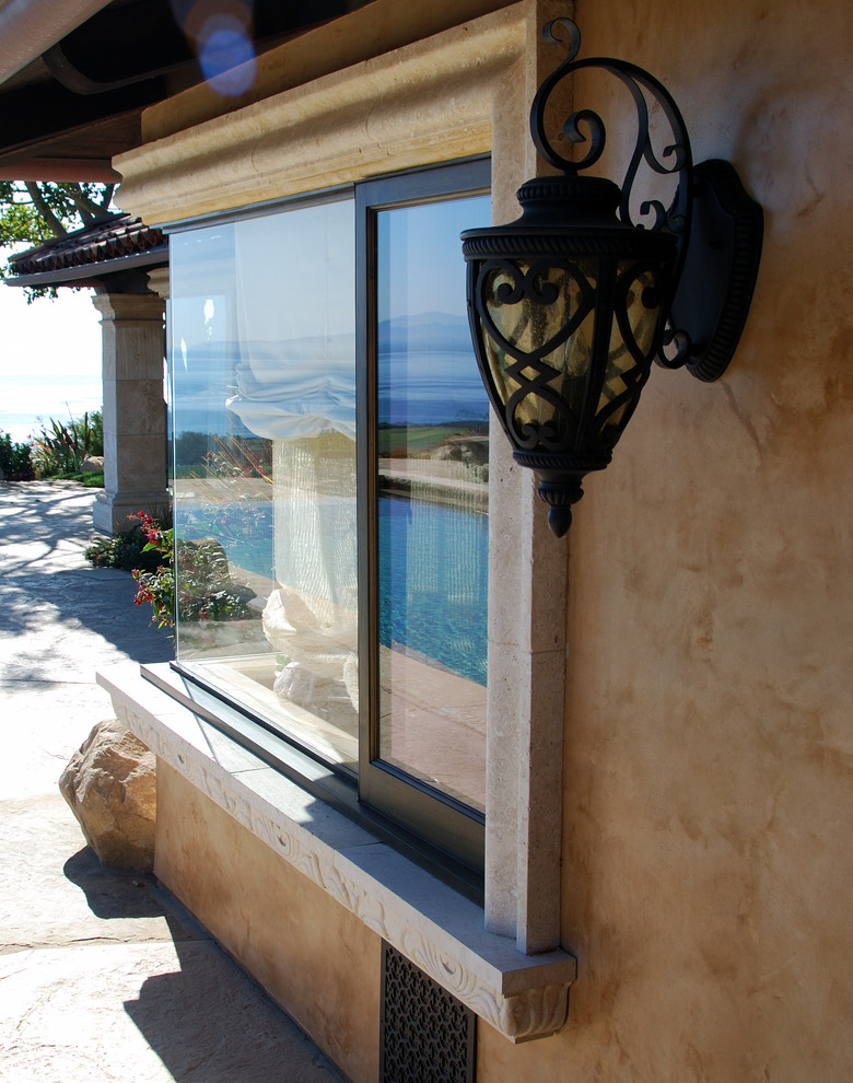 Design ideas for a mediterranean house exterior in Santa Barbara.