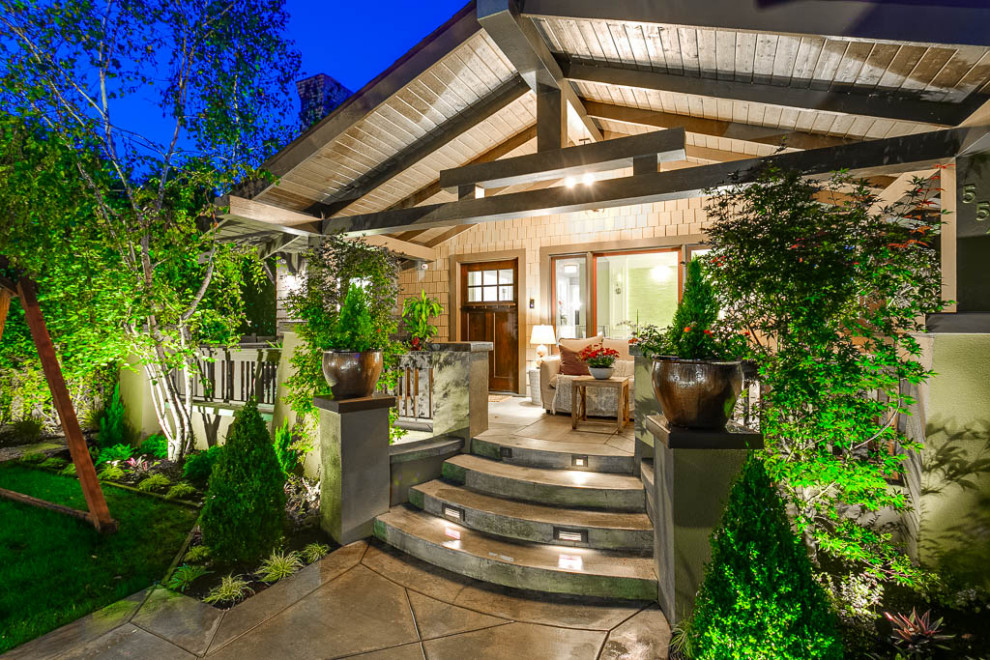 Inspiration for a mid-sized craftsman beige two-story wood exterior home remodel in Los Angeles