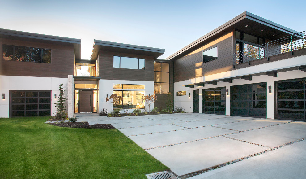 Geräumiges, Zweistöckiges Modernes Einfamilienhaus mit Mix-Fassade, bunter Fassadenfarbe und Flachdach in Seattle
