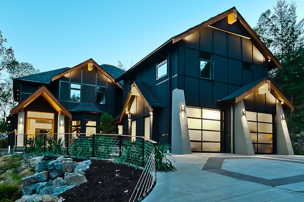Inspiration pour une façade de maison grise minimaliste de taille moyenne avec un revêtement mixte.