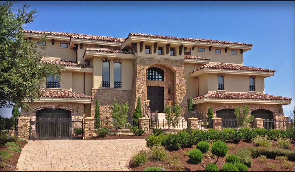 Tuscan three-story exterior home photo in Other