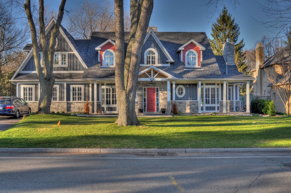 This is an example of a classic two floor house exterior in Toronto with mixed cladding.