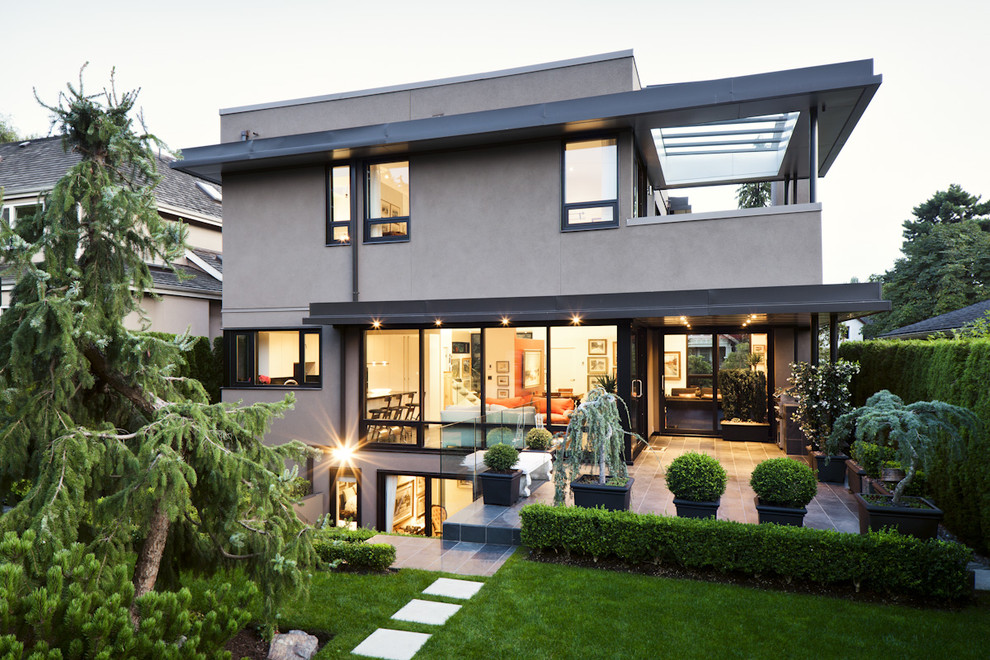 Trendy two-story exterior home photo in Vancouver