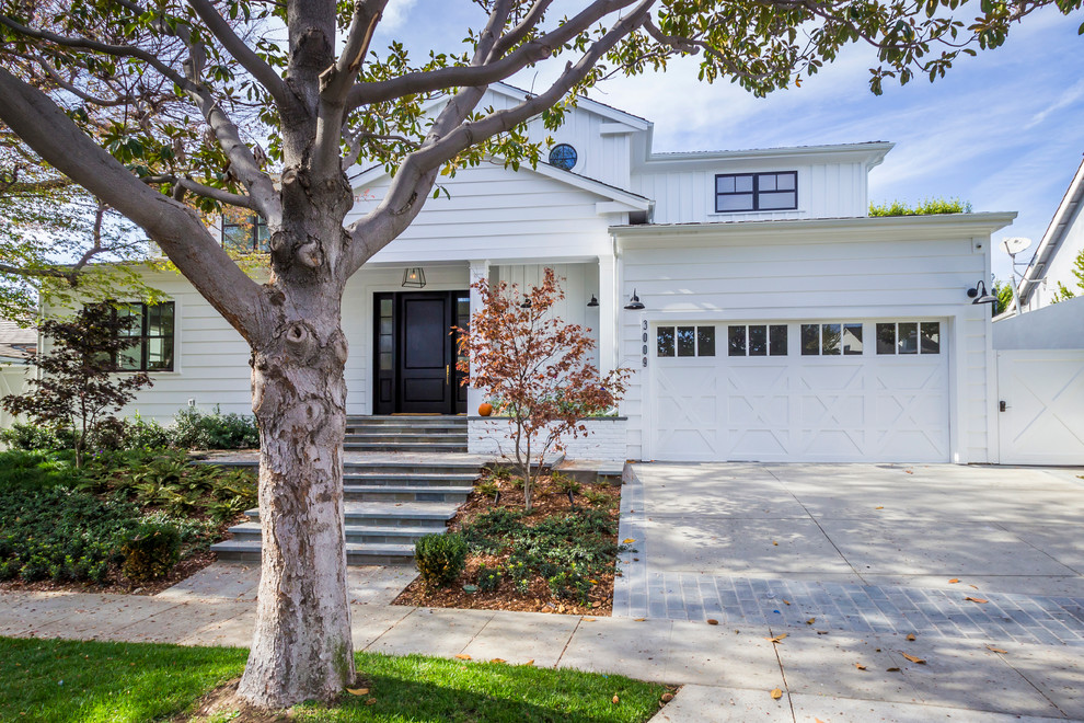 Transitional white exterior home idea in Los Angeles