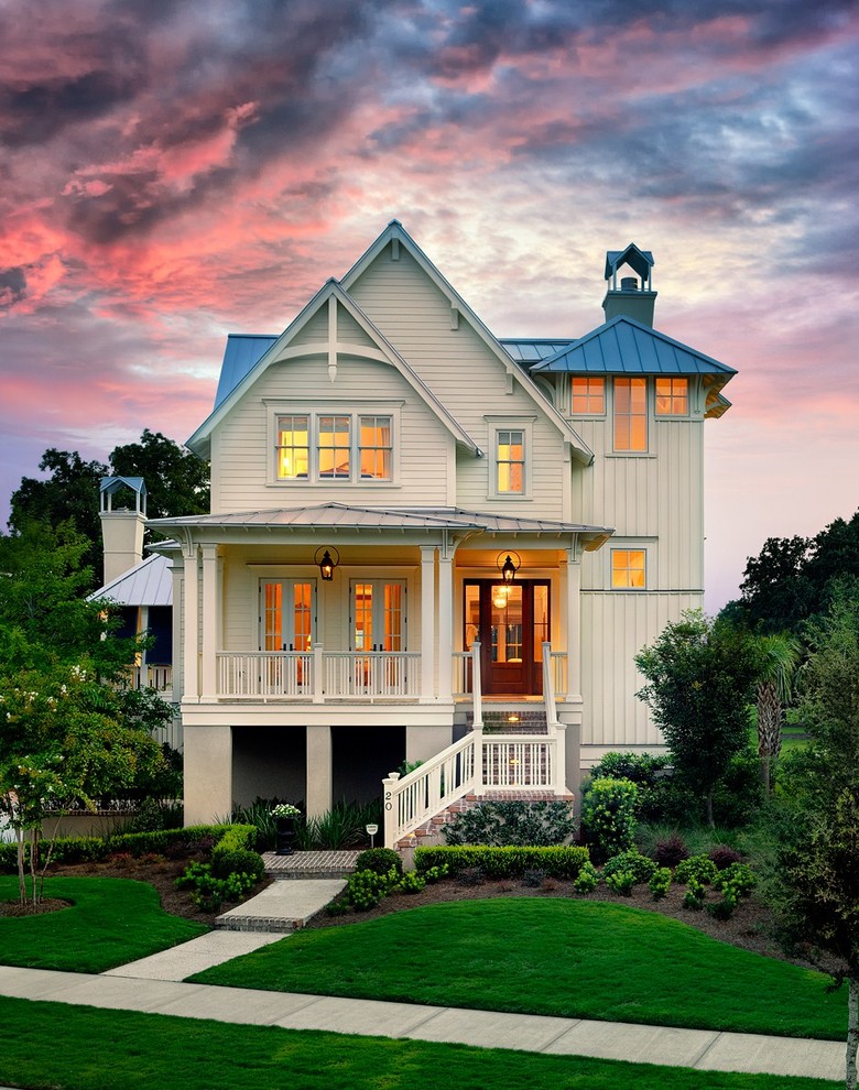 Inspiration for a victorian white two-story exterior home remodel in Charleston