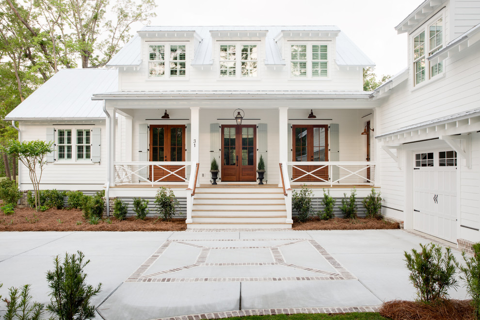 Farmhouse white two-story wood house exterior idea in Charleston with a metal roof and a white roof