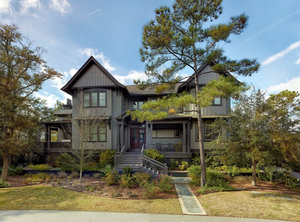 Example of a large two-story exterior home design in Charleston