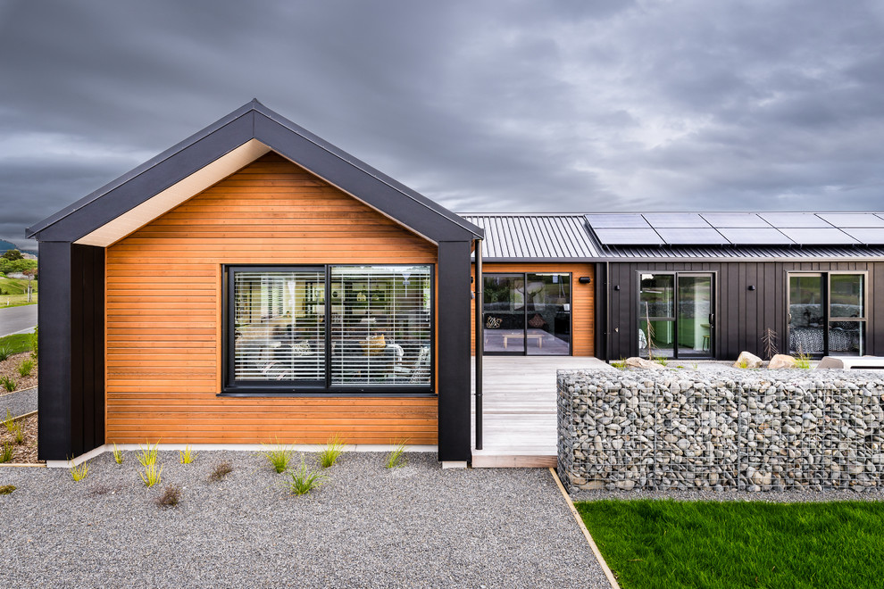 Medium sized modern bungalow house exterior in Wellington.