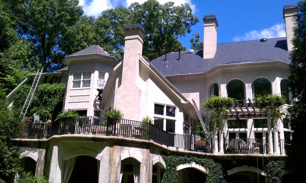 Example of an island style exterior home design in Atlanta
