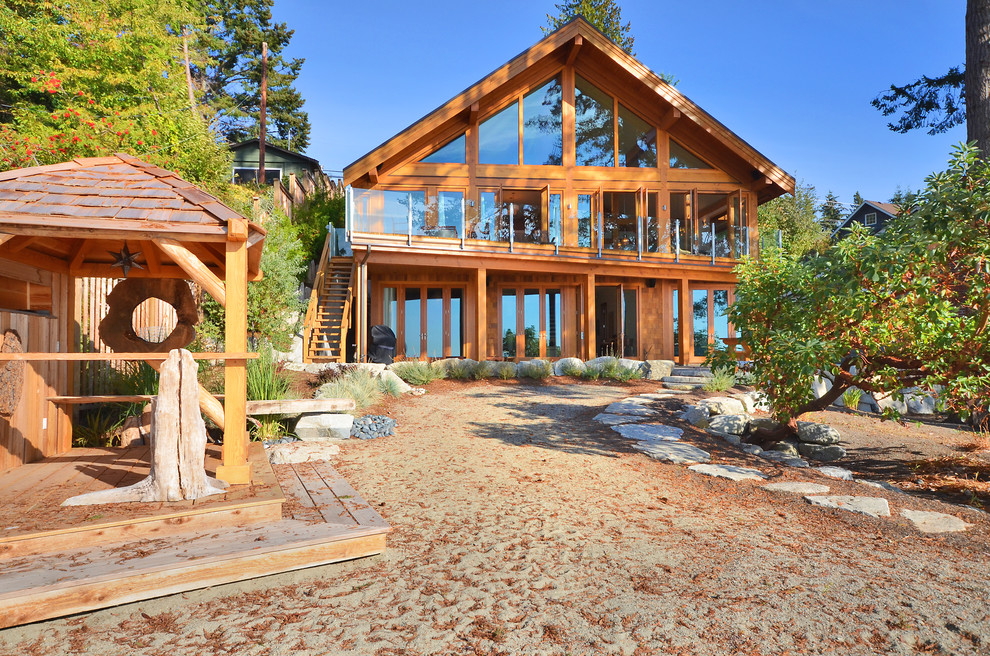 Photo of a rustic two floor house exterior in Vancouver.