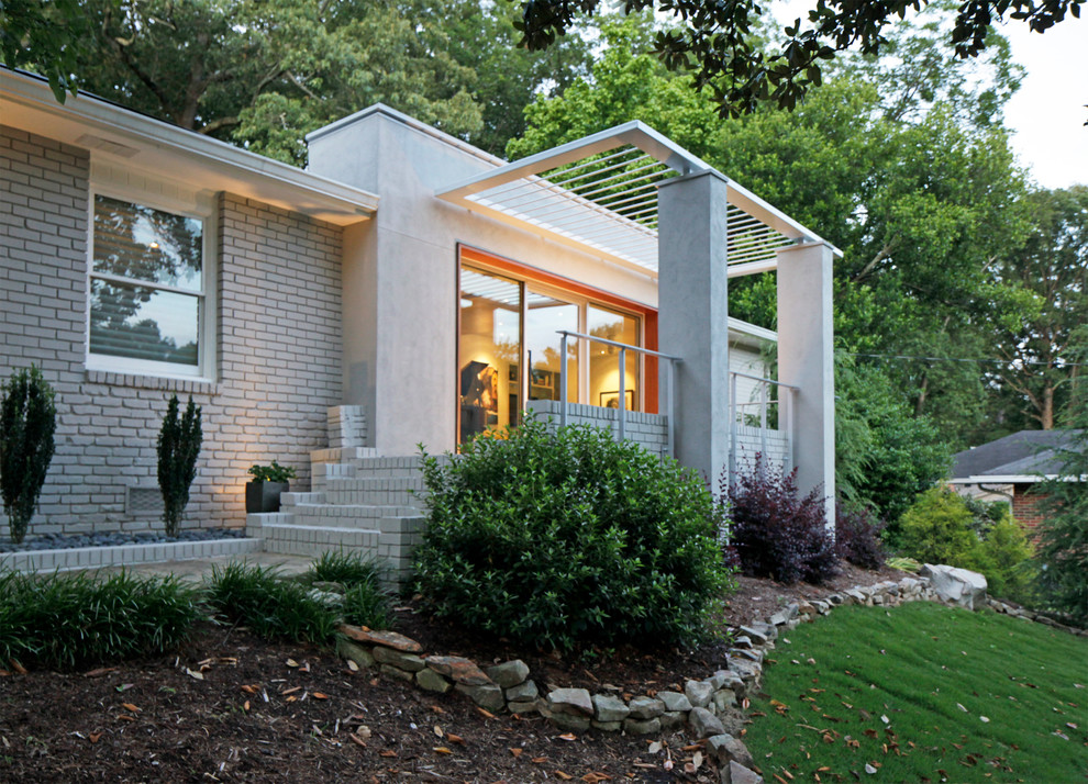 Design ideas for a gey contemporary house exterior in Atlanta with mixed cladding.