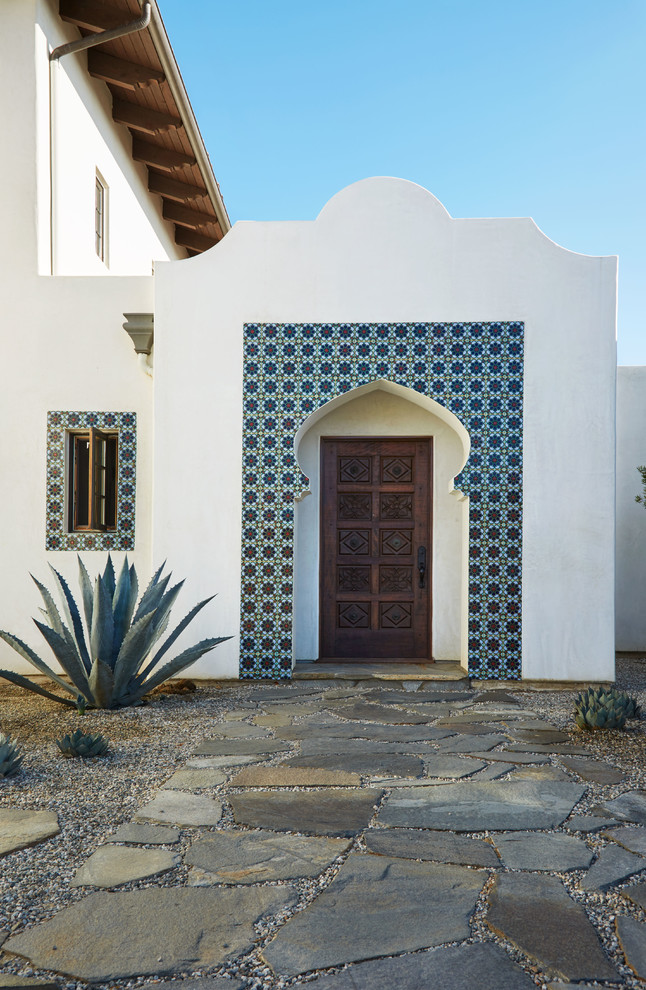 Design ideas for a white mediterranean house exterior in Los Angeles.