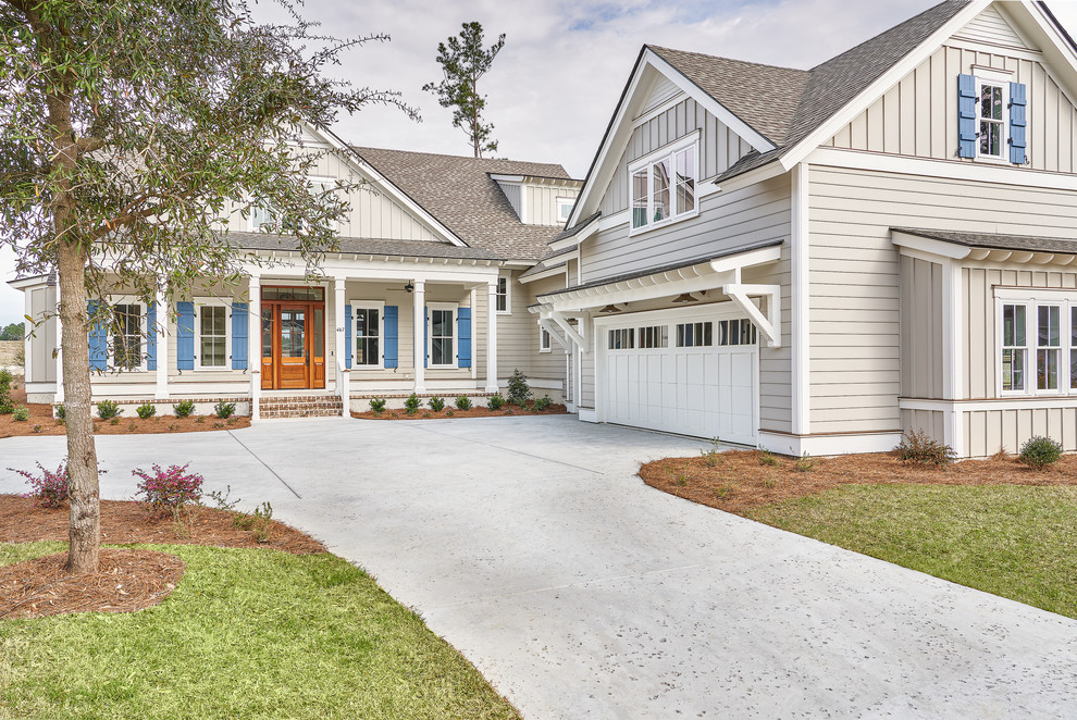 Large transitional gray two-story exterior home photo in Charleston with a shingle roof