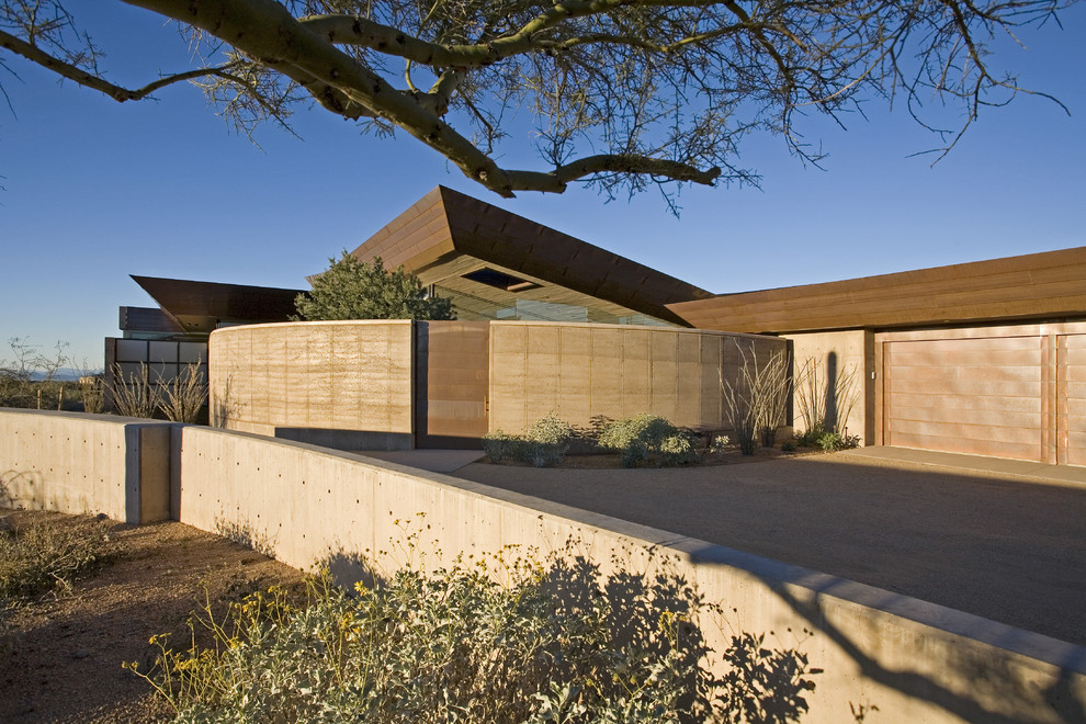 Design ideas for a contemporary house exterior in Phoenix.