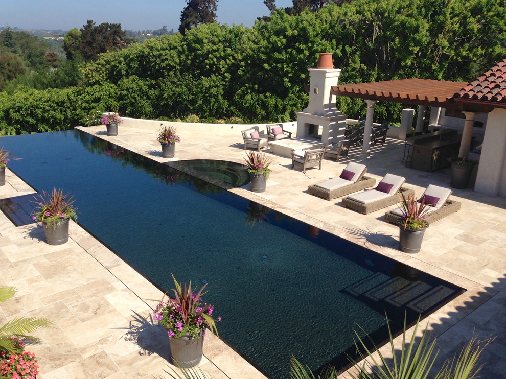 Huge mediterranean beige stucco house exterior idea in San Diego with a shingle roof