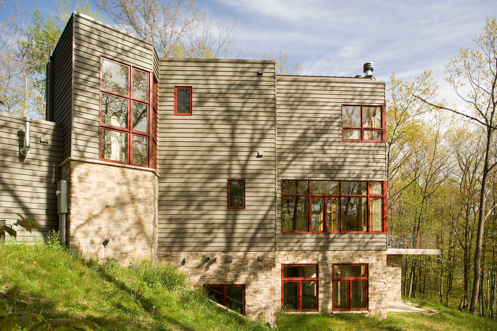 Inspiration for a contemporary three-story exterior home remodel in Minneapolis