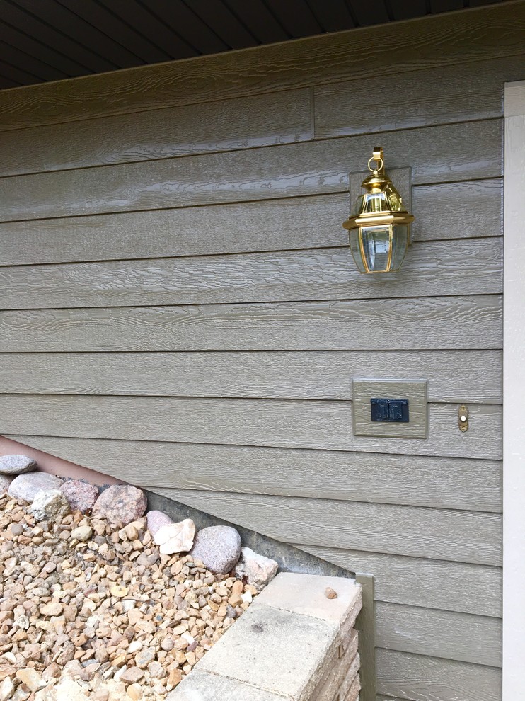 Diamond Kote siding, aluminum Dark bronze soffit and gutters Exterior