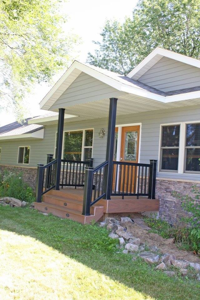 Inspiration for a mid-sized timeless gray one-story mixed siding exterior home remodel in Minneapolis