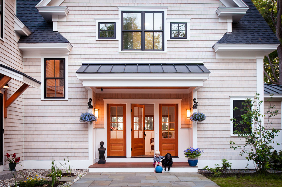 Design ideas for a classic two floor house exterior in Portland Maine with wood cladding.