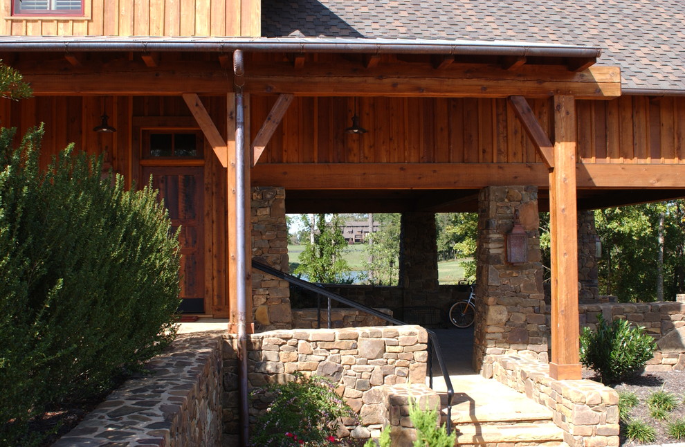 Example of a cottage exterior home design in Charlotte