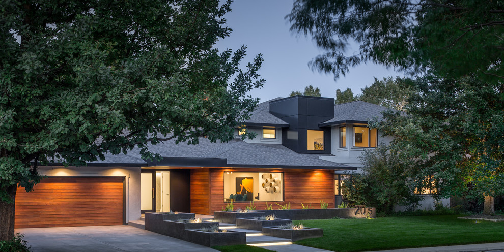Inspiration for a huge contemporary two-story wood exterior home remodel in Denver