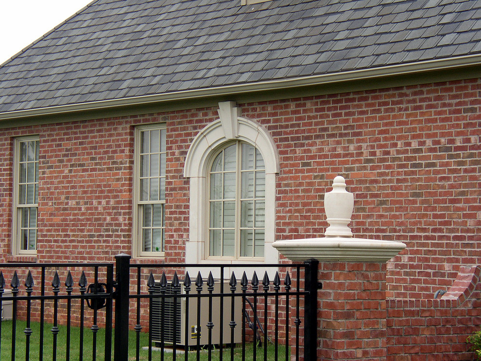 Traditional brick exterior home idea in Dallas