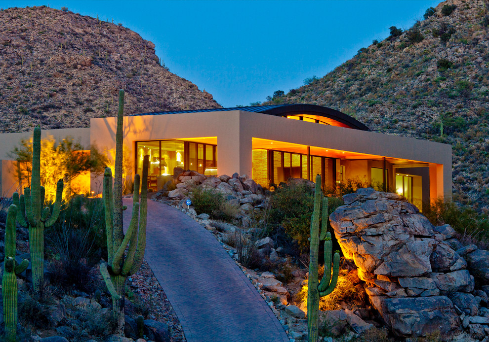 Inspiration for a contemporary one-story exterior home remodel in Phoenix