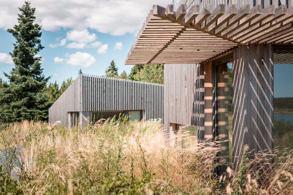 Design ideas for a scandinavian house exterior in Portland Maine.