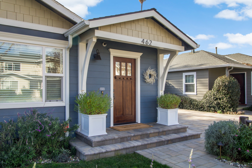 Mid-sized craftsman blue one-story concrete exterior home idea in San Francisco with a shingle roof