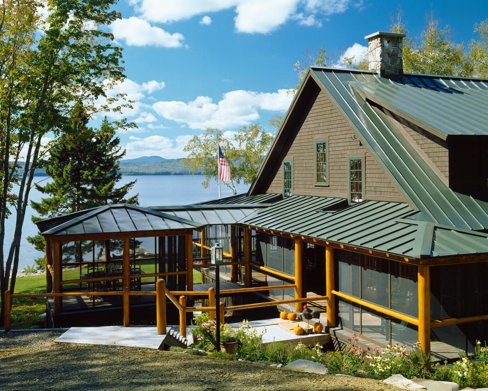 Example of a mountain style exterior home design in Portland Maine