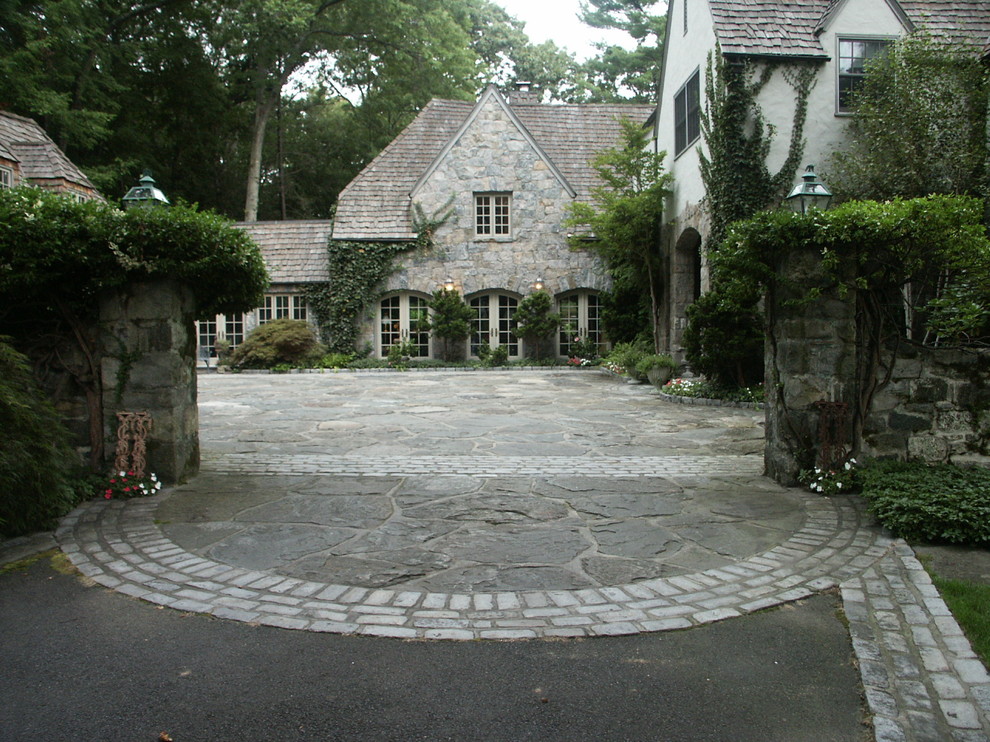 This is an example of a traditional house exterior in New York with stone cladding.