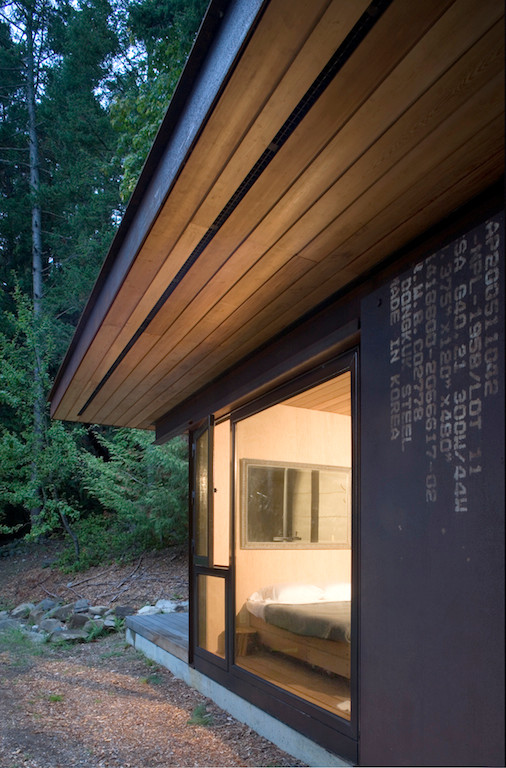 Design ideas for a rustic house exterior in Vancouver.
