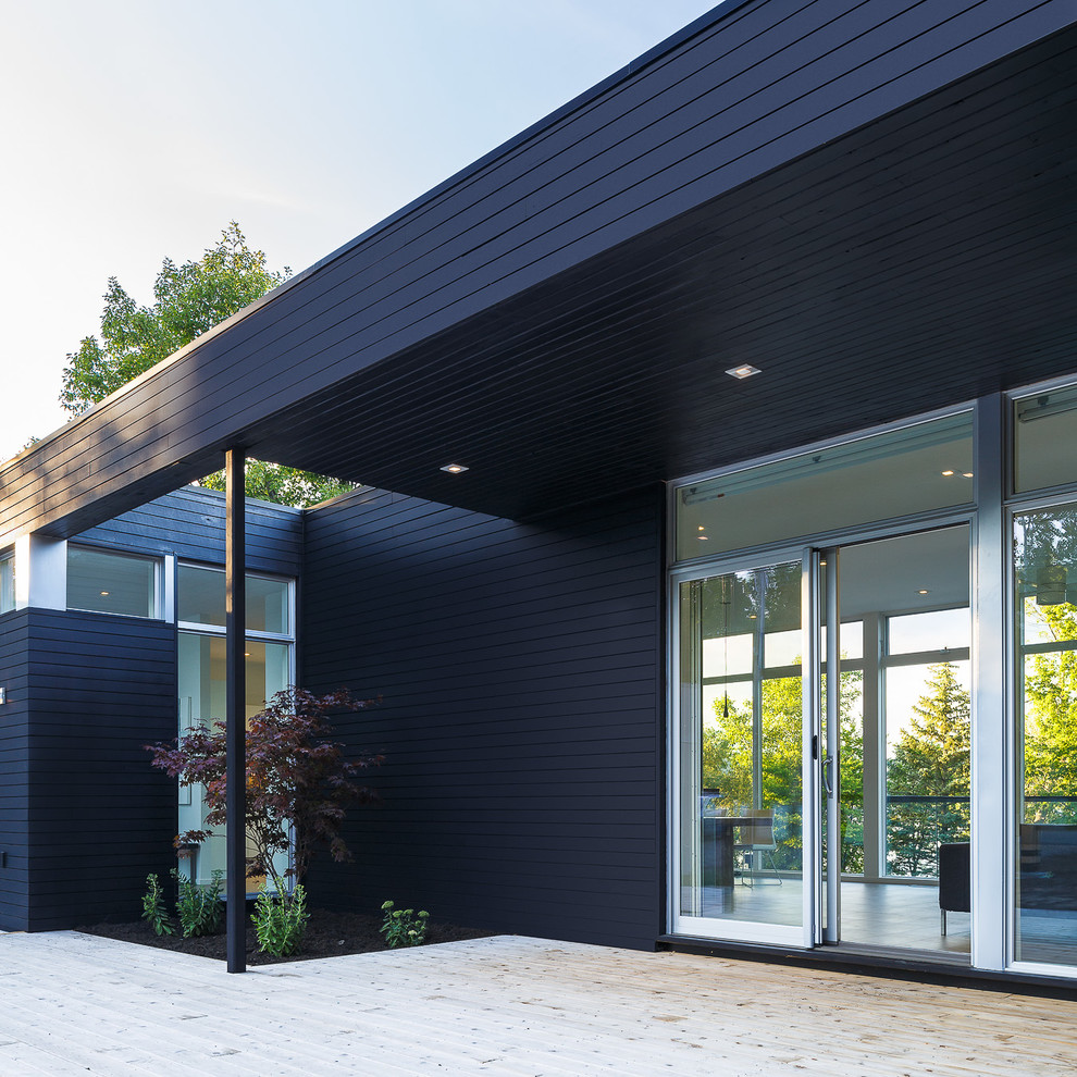 Example of a minimalist exterior home design in Ottawa
