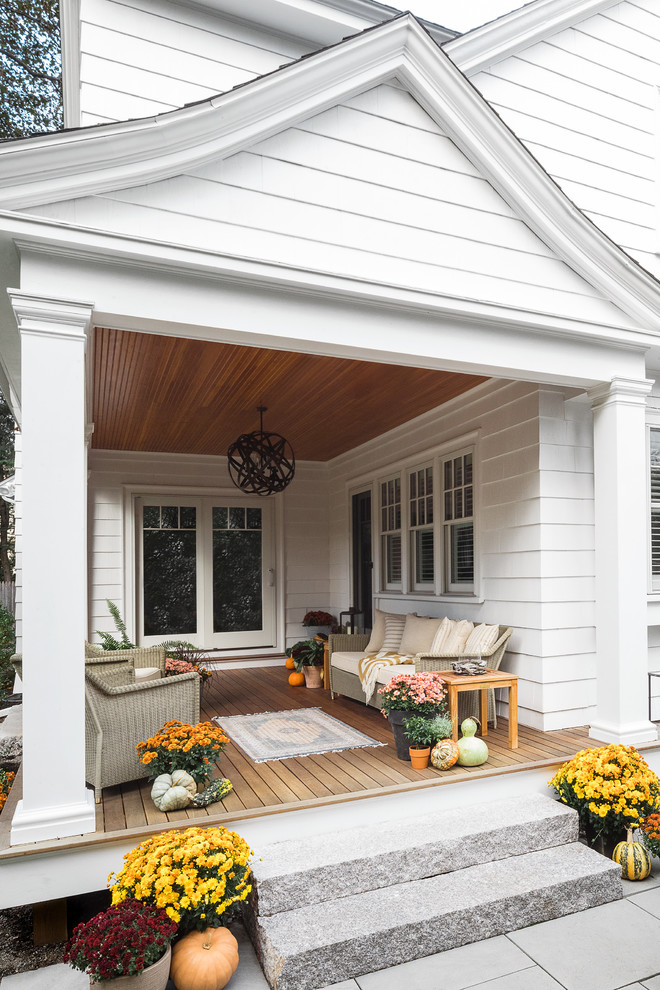 Mid-sized elegant white two-story wood house exterior photo in Boston with a shingle roof