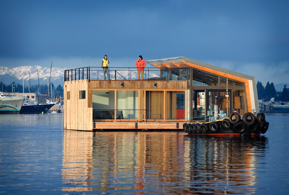 Aménagement d'une petite façade de maison industrielle de plain-pied.