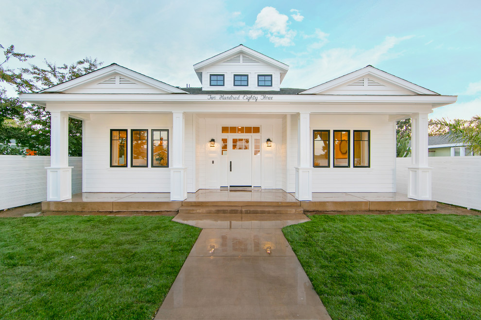 Large traditional white one-story concrete fiberboard gable roof idea in Orange County