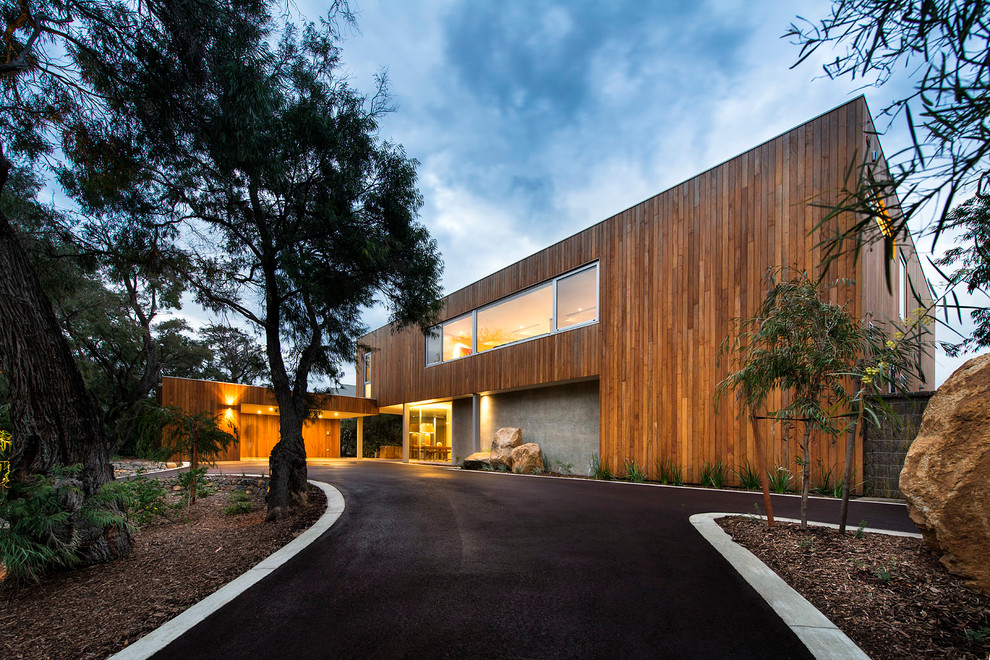 Inspiration for a large contemporary two-story wood exterior home remodel in Perth