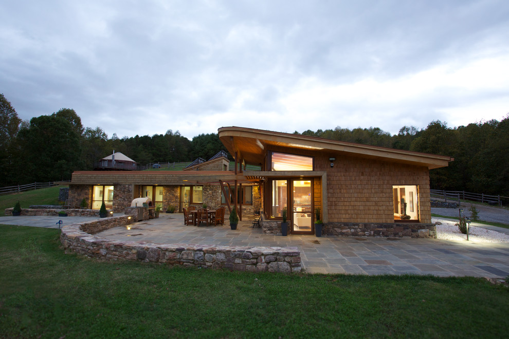 Mountain style one-story wood exterior home photo in Portland Maine
