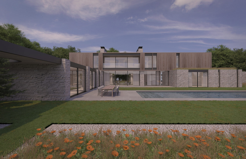 Стильный дизайн: большой, двухэтажный, бежевый частный загородный дом в стиле модернизм с комбинированной облицовкой, плоской крышей и зеленой крышей - последний тренд
