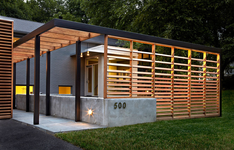 Inspiration for a contemporary brick house exterior in DC Metro.
