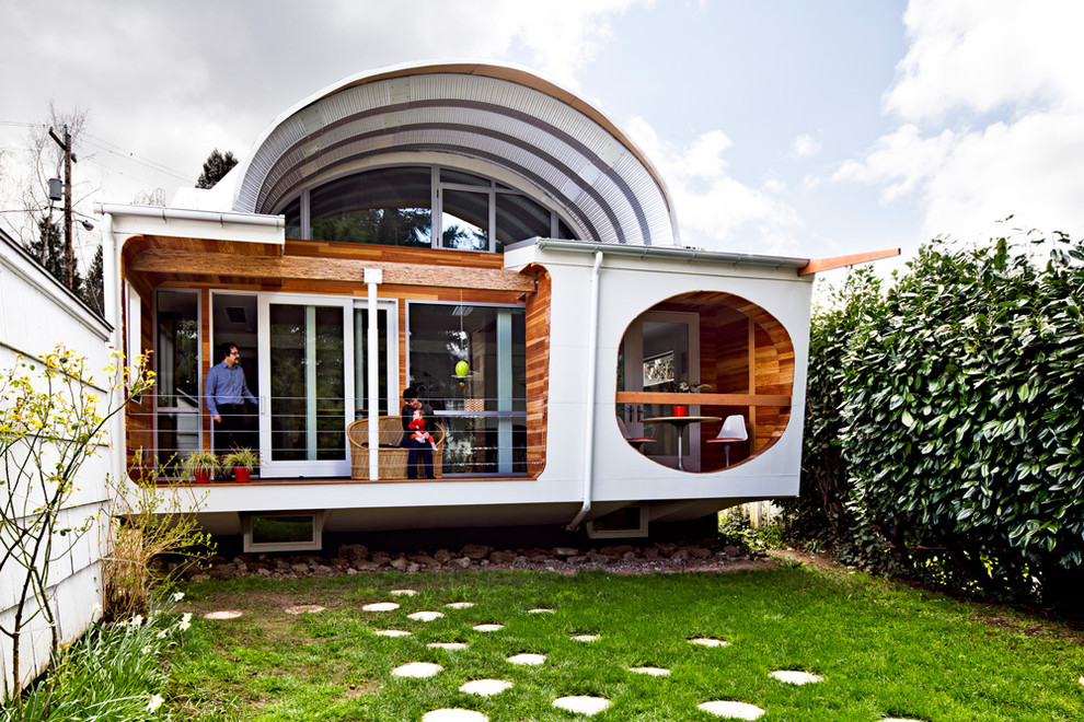 Example of a small eclectic exterior home design in Portland