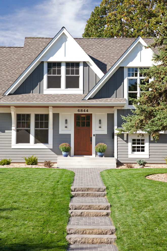 Traditional gray two-story exterior home idea in Minneapolis