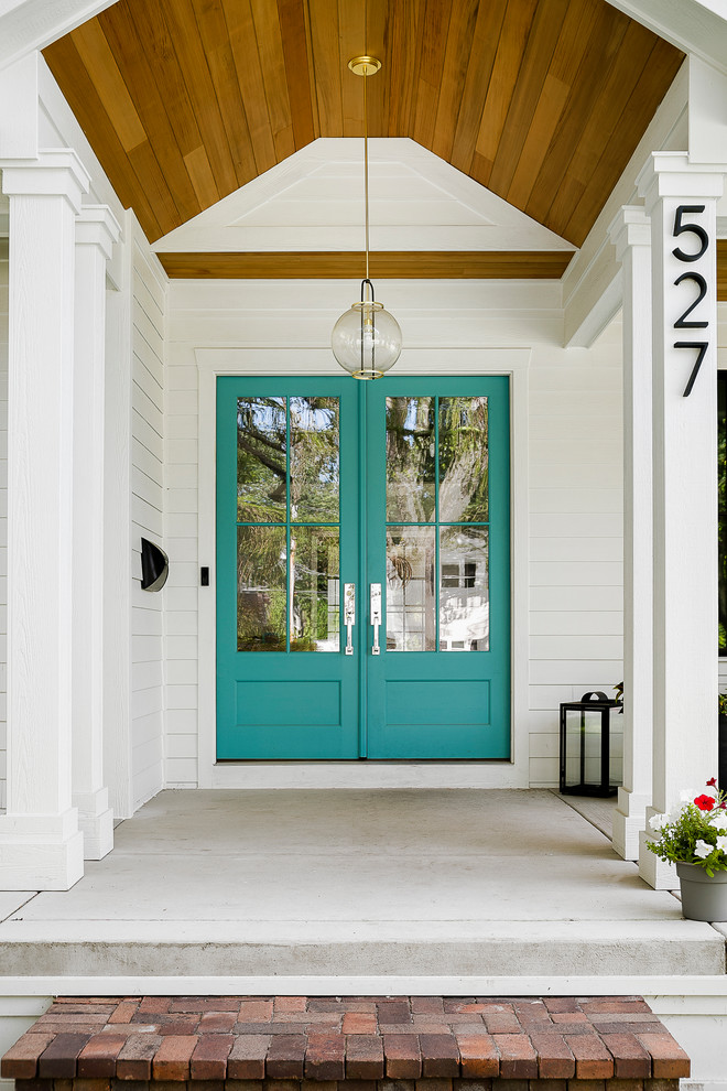 Inspiration for a farmhouse exterior home remodel in Chicago