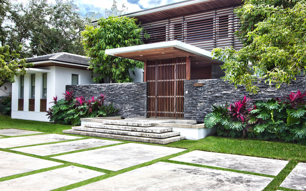 Contemporary two-story exterior home idea in Miami