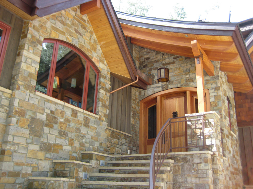 Example of a mountain style house exterior design in Albuquerque