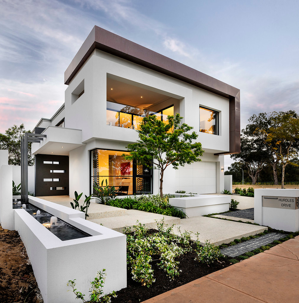 Trendy white two-story flat roof photo in Perth