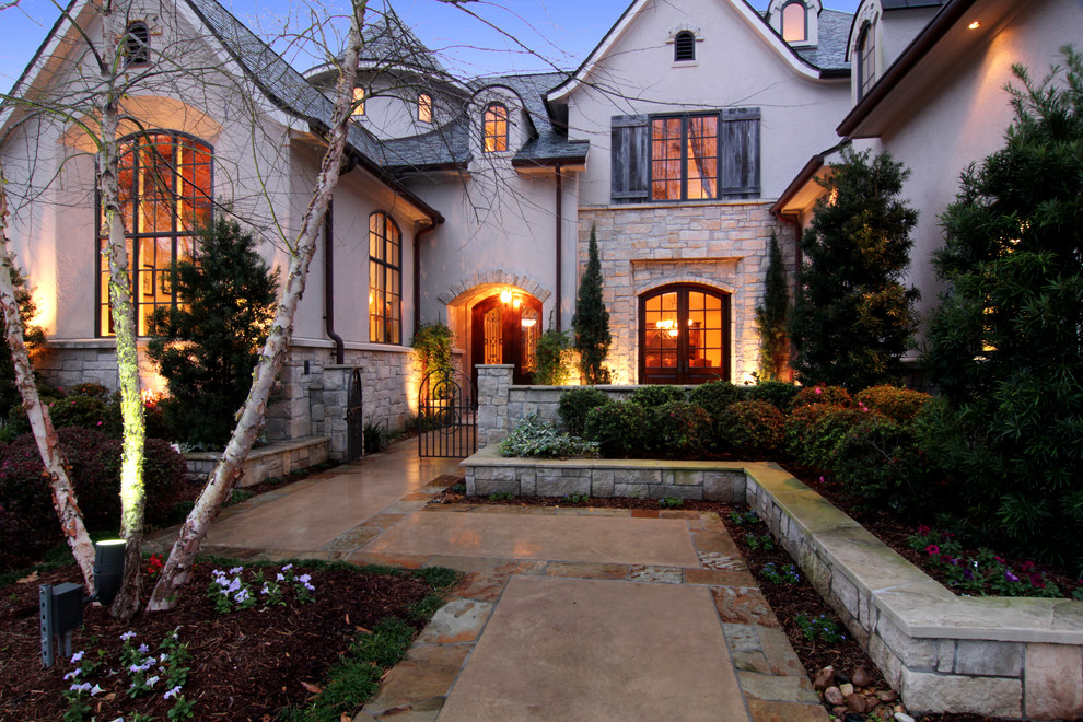 Mediterranean house exterior in Houston with stone cladding.