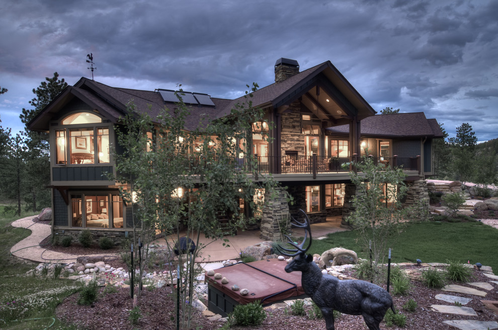 Photo of a rustic two floor house exterior in Denver.