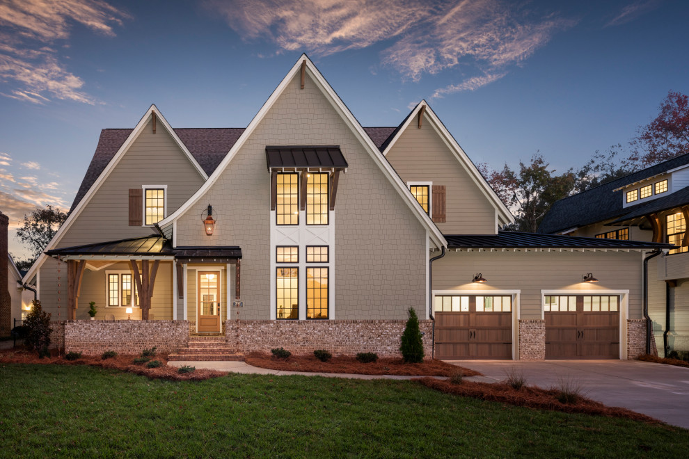 Large transitional beige two-story concrete fiberboard exterior home photo in Charlotte with a shingle roof