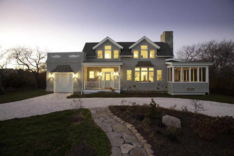 Design ideas for a traditional house exterior in Boston with wood cladding.